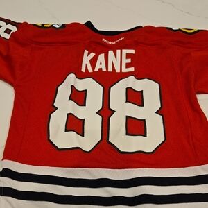 Reebok Youth Red and White Hockey Jersey